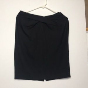 Simple twist black skirt.